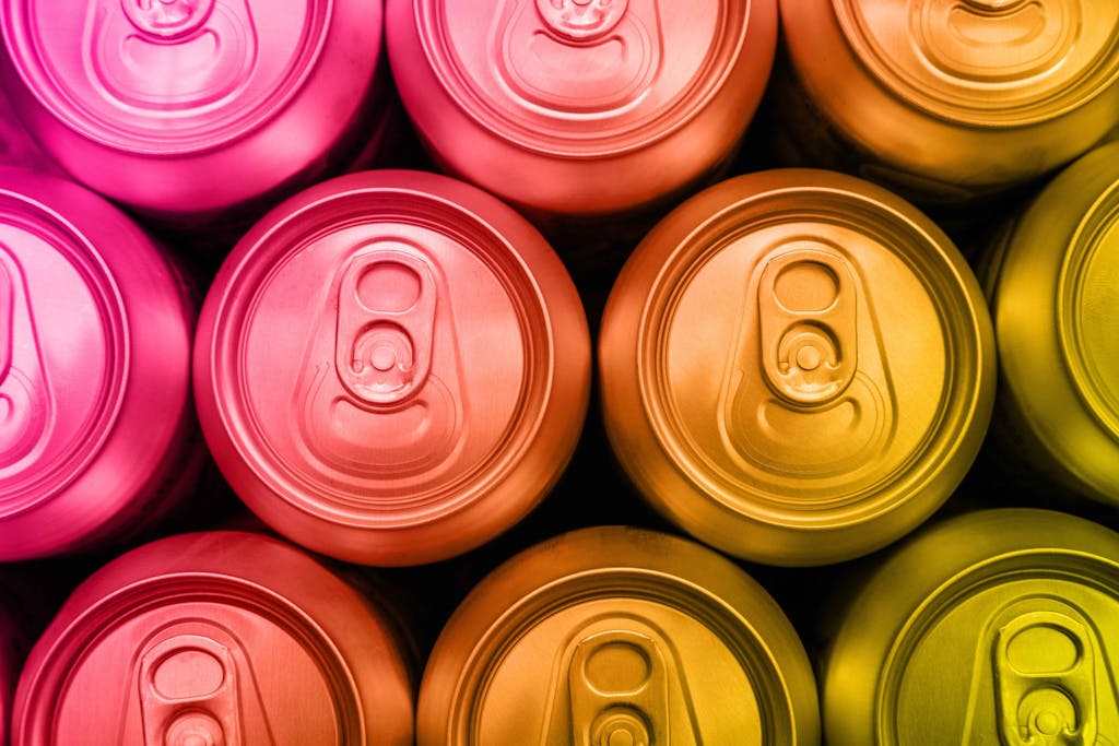 Colorful metal soda drink cans overhead