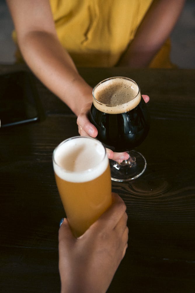 Person Holding Wine Glass